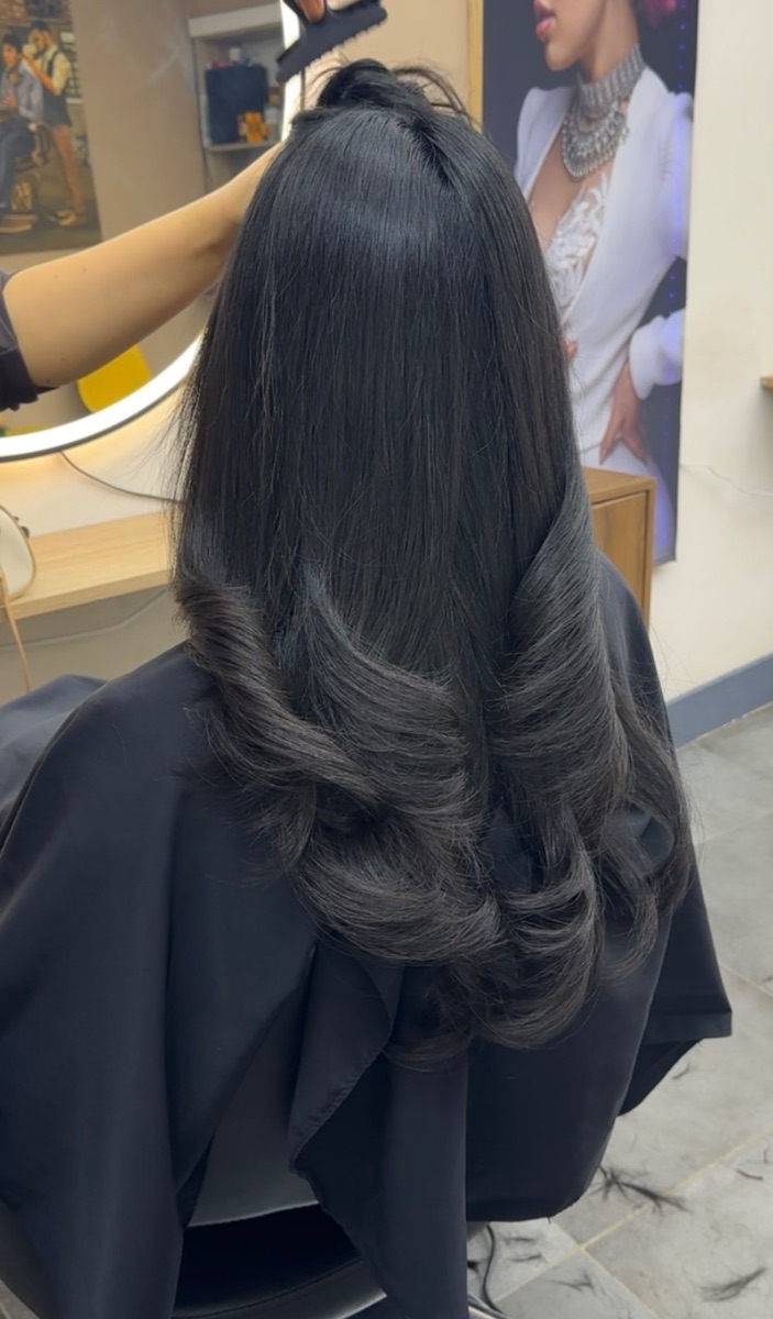 Foto van Model föhnen (lang haar)